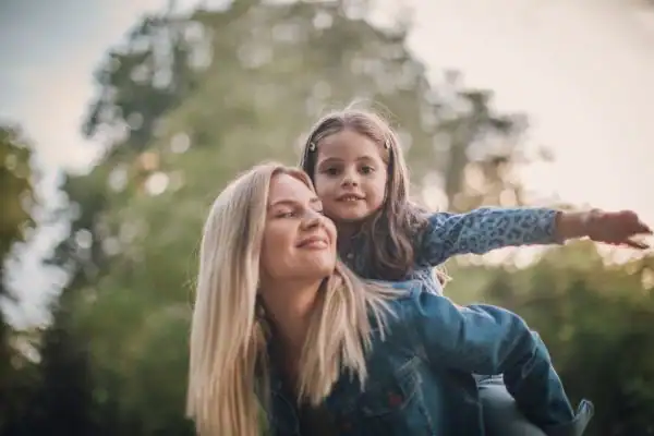 happy mum and daughter following mediation to resolve parental alienation Poole